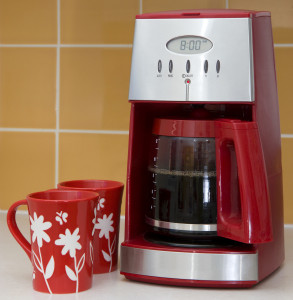 Red Drip Coffee Machine and Coffee Mugs